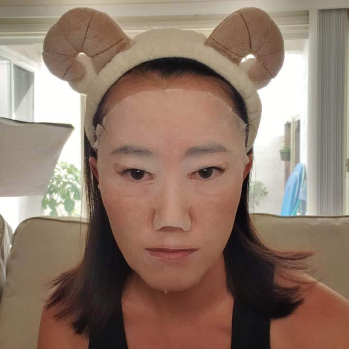 Glass-skin flat lay: toner, ampoule, and sheet mask for dewy finish