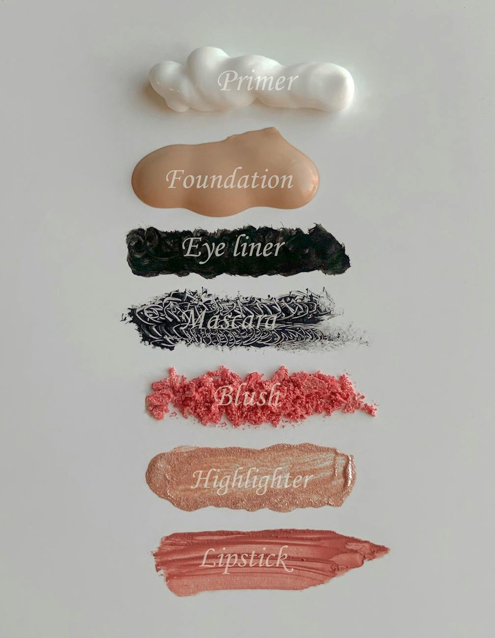 cosmetic product swatches on white surface