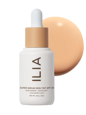 Ilia Super Serum Skin Tint SPF 40 dropper bottle and serum-like swatches on diverse hands for anti-aging hydration over 50