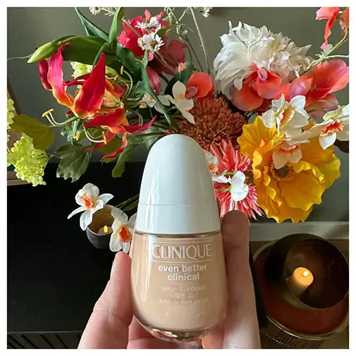 Clinique Even Better Clinical Serum Foundation in a background of flowers