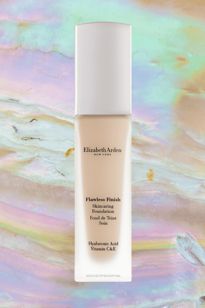 Elizabeth Arden Flawless Finish Foundation in its sleek packaging with a radiant background.