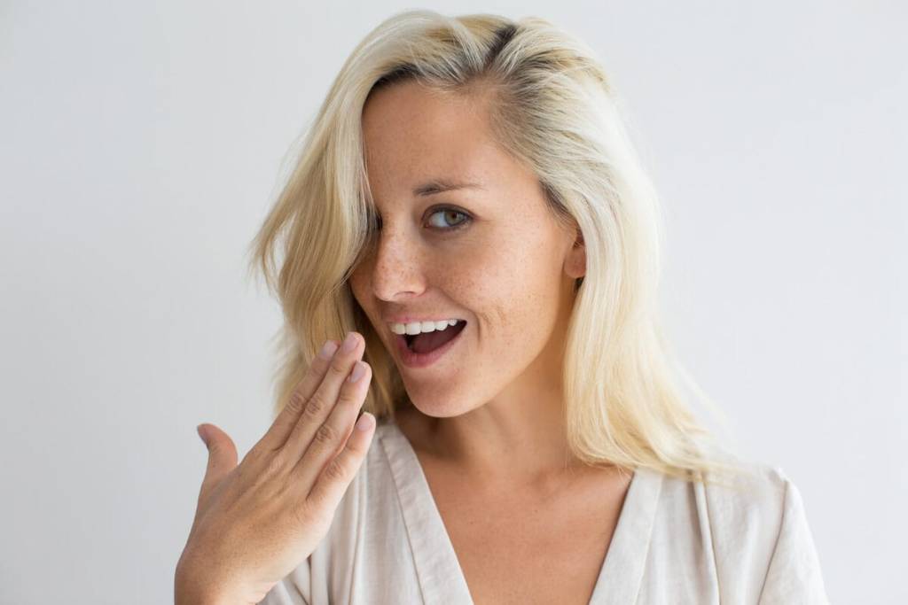 woman smiling because she tried the Best Foundation for Mature Skin