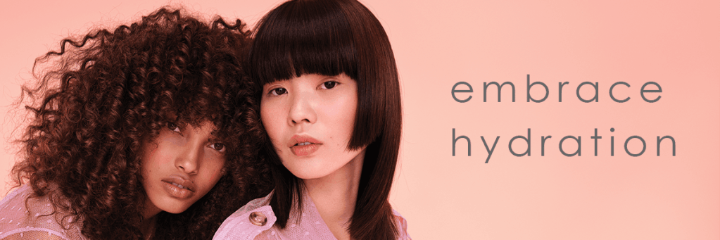 Mature woman applying hydrating serum to plump skin, showcasing embrace hydration and prep routine for flawless makeup over 50.