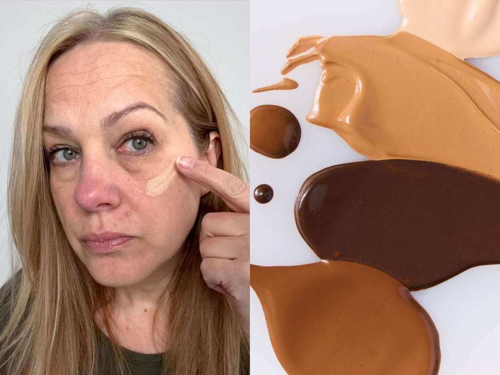 Middle-aged woman applying concealer under eyes to cover dark circles.