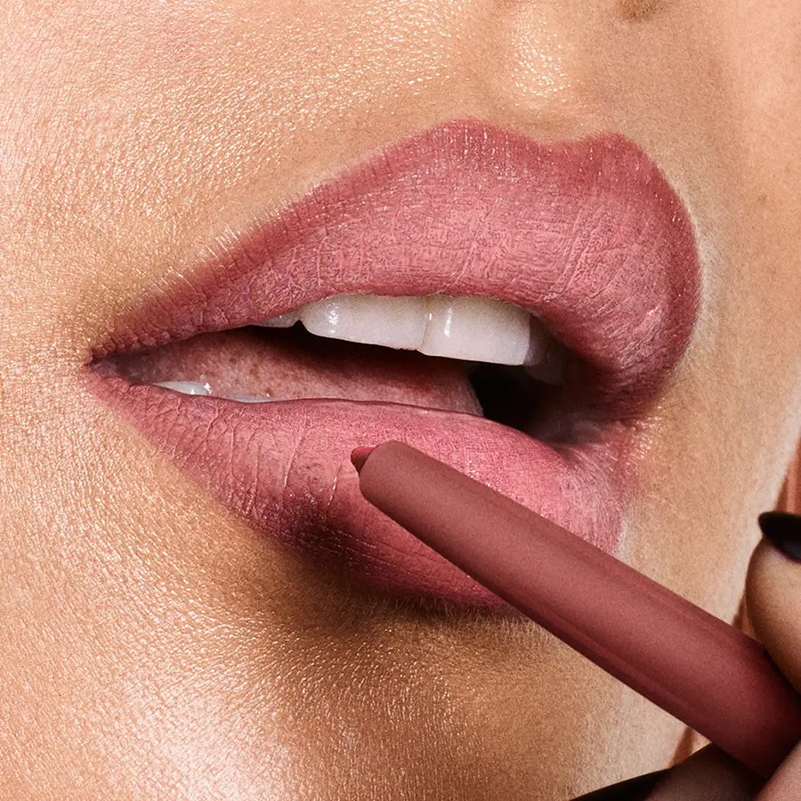 Official Revlon close-up showing ColorStay lip liner defining and filling the lips